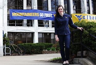 Chelsea Arvin standing in front of the Mountainlair.